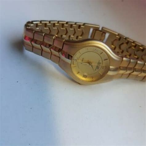 rolex oyster perpetual quartz 23k 30m